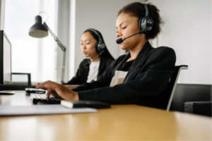 people using headsets providing contact centre solutions
